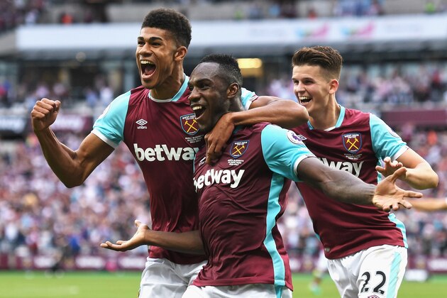 LONDON, ENGLAND - AUGUST 21: Michail Antonio (C) of West Ham United celebrates scoring the opening goal with team mates Ashley Fletcher (L) and Sam Byram during the Premier League match between West Ham United and AFC Bournemouth at London Stadium on August 21, 2016 in London, England. (Photo by Michael Regan/Getty Images) LONDON, ENGLAND - AUGUST 21: Michail Antonio (C) of West Ham United celebrates scoring the opening goal with team mates Ashley Fletcher (L) and Sam Byram during the Premier League match between West Ham United and AFC Bournemouth at London Stadium on August 21, 2016 in London, England. (Photo by Michael Regan/Getty Images)