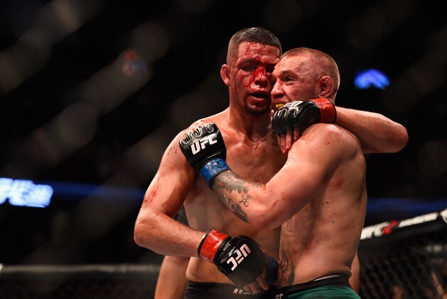 LAS VEGAS, NV - AUGUST 20:  Nate Diaz shakes hands wih Conor McGregor of Ireland at the completion of their welterweight bout during the UFC 202 event at T-Mobile Arena on August 20, 2016 in Las Vegas, Nevada.  (Photo by Jeff Bottari/Zuffa LLC/Zuffa LLC via Getty Images)