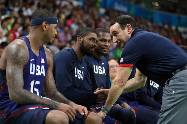 RIO DE JANEIRO, BRAZIL - AUGUST 21: Head coach Mike Krzyzewski talks with Carmelo Anthony of the United States during the Men's Gold medal game against Serbia on Day 16 of the Rio 2016 Olympic Games at Carioca Arena 1 on August 21, 2016 in Rio de Janeiro, Brazil. (Photo by Amin Mohammad Jamali/Getty Images) RIO DE JANEIRO, BRAZIL - AUGUST 21: Head coach Mike Krzyzewski talks with Carmelo Anthony of the United States during the Men's Gold medal game against Serbia on Day 16 of the Rio 2016 Olympic Games at Carioca Arena 1 on August 21, 2016 in Rio de Janeiro, Brazil. (Photo by Amin Mohammad Jamali/Getty Images)