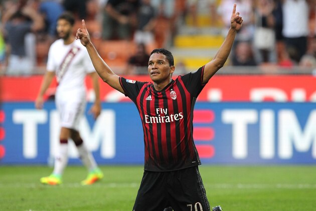 MILAN, ITALY - AUGUST 21:  Carlos Bacca of AC Milan celebrates his second goal during the Serie A match between AC Milan and FC Torino at Stadio Giuseppe Meazza on August 21, 2016 in Milan, Italy.  (Photo by Marco Luzzani/Getty Images)