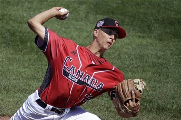 Canada's Loreto Siniscalchi delivers during the first inning of an International pool play baseball game against Japan at the Little League World Series tournament in South Williamsport, Pa., Friday, Aug. 19, 2016. (AP Photo/Gene J. Puskar)