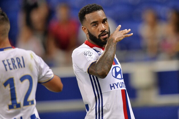 Lyon's French forward Alexandre Lacazette gestures during the French Ligue 1 football match Olympique Lyonnais (OL) against Caen (SMC) on August 19, 2016, at the Parc Olympique Lyonnais stadium in Decines-Charpieu near Lyon, southeastern France.    / AFP / ROMAIN LAFABREGUE        (Photo credit should read ROMAIN LAFABREGUE/AFP/Getty Images)