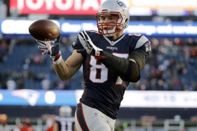 New England Patriots tight end Rob Gronkowski (87) warms up before an NFL divisional playoff football game against the Kansas City Chiefs, Saturday, Jan. 16, 2016, in Foxborough, Mass. (AP Photo/Elise Amendola)