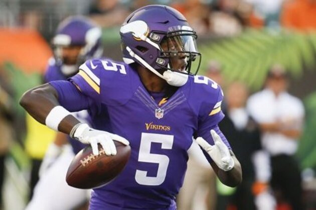Minnesota Vikings quarterback Teddy Bridgewater (5) looks to pass in the first half of an NFL preseason football game against the Cincinnati Bengals, Friday, Aug. 12, 2016, in Cincinnati. (AP Photo/Gary Landers)
