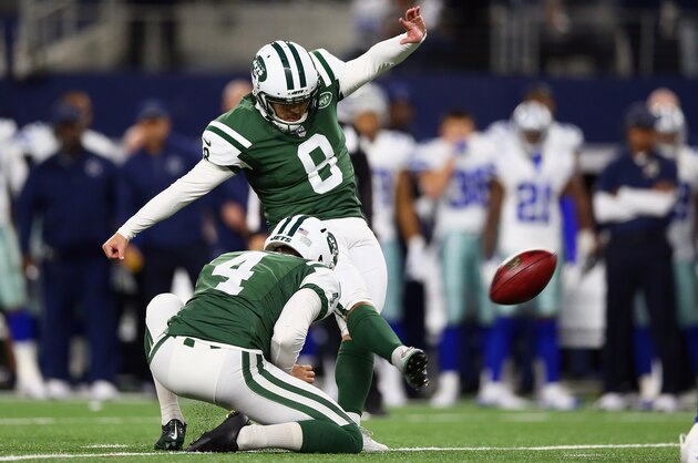 ARLINGTON, TX - DECEMBER 19:  Randy Bullock #8 of the New York Jets kicks the game winning field goal against the Dallas Cowboys in the fourth quarterat AT&T Stadium on December 19, 2015 in Arlington, Texas.  (Photo by Ronald Martinez/Getty Images)