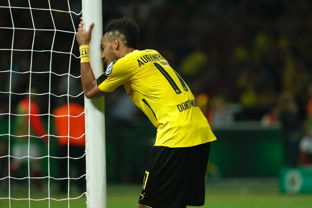 Dortmund's Gabonese striker Pierre-Emerick Aubameyang reacts during the German Cup (DFB Pokal) final football match Bayern Munich vs Borussia Dortmund at the Olympic stadium in Berlin on May 21, 2016. / AFP / ODD ANDERSEN / RESTRICTIONS: ACCORDING TO DFB RULES IMAGE SEQUENCES TO SIMULATE VIDEO IS NOT ALLOWED DURING MATCH TIME. MOBILE (MMS) USE IS NOT ALLOWED DURING AND FOR FURTHER TWO HOURS AFTER THE MATCH. == RESTRICTED TO EDITORIAL USE == FOR MORE INFORMATION CONTACT DFB DIRECTLY AT +49 69 67880

 /         (Photo credit should read ODD ANDERSEN/AFP/Getty Images)