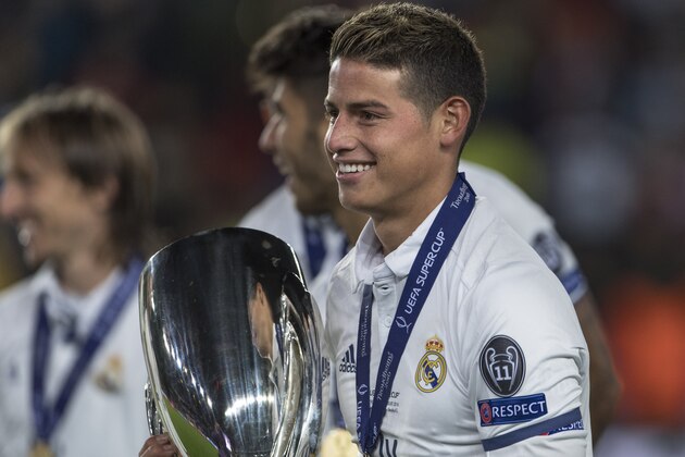 TRONDHEIM, NORWAY - AUGUST 09:  James Rodriguez of Real Madrid celebrate with  the trophy after theUEFA Super Cup match between Real Madrid and Sevilla at the Lerkendal Stadion on August 9, 2016 in Trondheim, Norway. (Photo by Trond Tandberg/Getty Images)