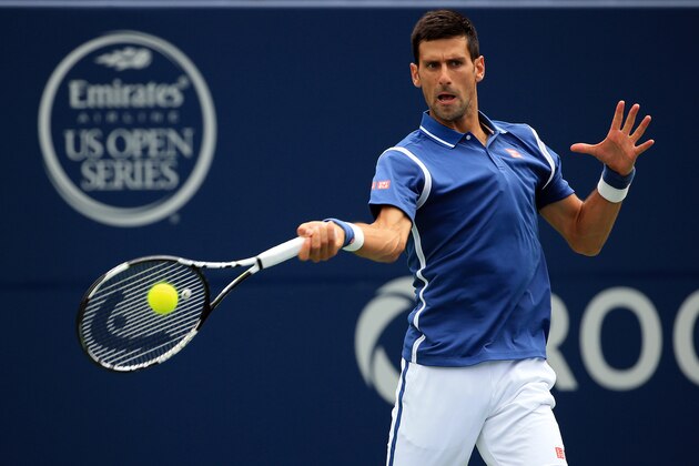 TORONTO, ON - JULY 31: Novak Djokovic of Serbia hits a shot against Kei Nishikori of Japan in the Singles Final during Day 7 of the Rogers Cup at the Aviva Centre on July 31, 2016 in Toronto, Ontario, Canada. (Photo by Vaughn Ridley/Getty Images)
