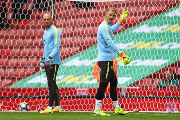 STOKE ON TRENT, ENGLAND - AUGUST 20: Joe Hart of Manchester City (R) warms up with team mate Willy Cabellero of Manchester City (L) during the Premier League match between Stoke City and Manchester City at Bet365 Stadium on August 20, 2016 in Stoke on Trent, England.  (Photo by Michael Steele/Getty Images)