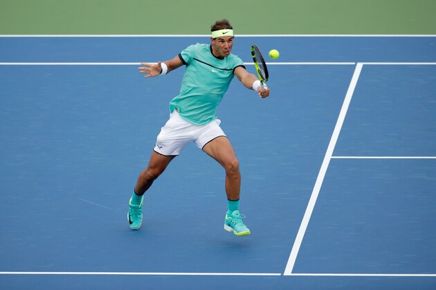 MASON, OH - AUGUST 17:  Rafael Nadal of Spain hits a return during his second round match against Pablo Cuevas during day 5 of the Western & Southern Open at the Lindner Family Tennis Center   on August 17, 2016 in Mason, Ohio.  (Photo by Andy Lyons/Getty Images)