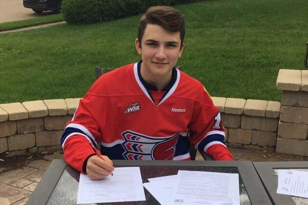 Luke Toporowski, signing to play with the Spokane Chiefs of the WHL.