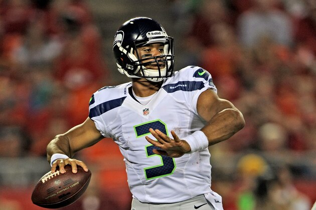 KANSAS CITY, MO - AUGUST 24:  Quarterback Russell Wilson #3 of the Seattle Seahawks drops back to pass against the Kansas City Chiefs during the second half of a preseason game on August 24, 2012 at Arrowhead Stadium in Kansas City, Missouri.  (Photo by Peter G. Aiken/Getty Images)