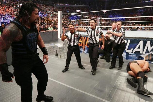 Roman Reigns lays a brutal beating on Rusev at SummerSlam.