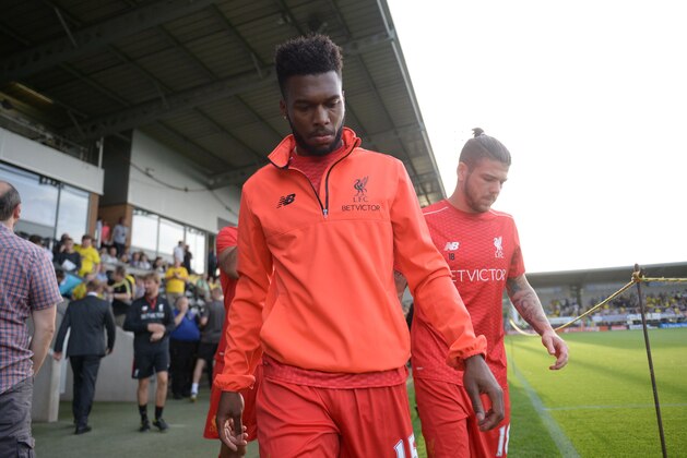 Liverpool's English striker Daniel Sturridge (L) and Liverpool's Spanish defender Alberto Moreno (R) arrive for the English League Cup second round football match between Burton Albion and Liverpool at the Pirelli Stadium in Burton-on-Trent, central England on August 23, 2016. / AFP / OLI SCARFF / RESTRICTED TO EDITORIAL USE. No use with unauthorized audio, video, data, fixture lists, club/league logos or 'live' services. Online in-match use limited to 75 images, no video emulation. No use in betting, games or single club/league/player publications.  /         (Photo credit should read OLI SCARFF/AFP/Getty Images)