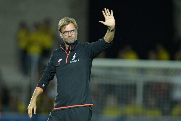 Liverpool's German manager Jurgen Klopp gestures at the end of the English League Cup second round football match between Burton Albion and Liverpool at the Pirelli Stadium in Burton-on-Trent, central England on August 23, 2016. / AFP / OLI SCARFF / RESTRICTED TO EDITORIAL USE. No use with unauthorized audio, video, data, fixture lists, club/league logos or 'live' services. Online in-match use limited to 75 images, no video emulation. No use in betting, games or single club/league/player publications.  /         (Photo credit should read OLI SCARFF/AFP/Getty Images)