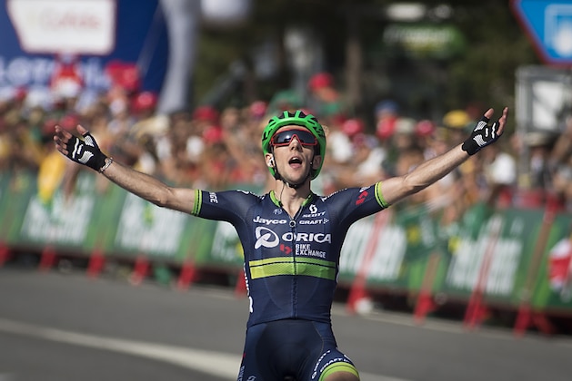 Orica-Bikeexchange's British cyclist Simon Yates celebrates as he crosses the finish line during the 6th stage of the 71st edition of 'La Vuelta' Tour of Spain, a 163,2 km route between Monforte de Lemos to Luintra on August 25, 2016. / AFP / JAIME REINA        (Photo credit should read JAIME REINA/AFP/Getty Images)