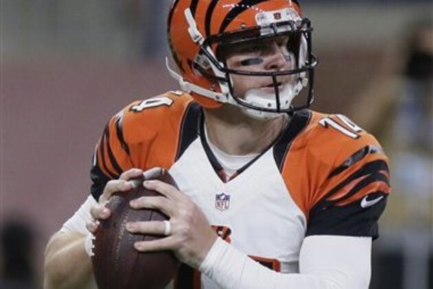 Cincinnati Bengals quarterback Andy Dalton (14) looks to pass against the Detroit Lions in the first half of an NFL preseason football game in Detroit, Thursday, Aug. 18, 2016. (AP Photo/Duane Burleson)