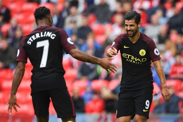 Manchester City's Spanish midfielder Nolito (R) celebrates with Manchester City's English midfielder Raheem Sterling after scoring their fourth goal during the English Premier League football match between Stoke City and Manchester City at the Bet365 Stadium in Stoke-on-Trent, central England on August 20, 2016.
Manchester City won the game 4-1. / AFP / Paul ELLIS / RESTRICTED TO EDITORIAL USE. No use with unauthorized audio, video, data, fixture lists, club/league logos or 'live' services. Online in-match use limited to 75 images, no video emulation. No use in betting, games or single club/league/player publications. / (Photo credit should read PAUL ELLIS/AFP/Getty Images) Manchester City's Spanish midfielder Nolito (R) celebrates with Manchester City's English midfielder Raheem Sterling after scoring their fourth goal during the English Premier League football match between Stoke City and Manchester City at the Bet365 Stadium in Stoke-on-Trent, central England on August 20, 2016.
Manchester City won the game 4-1. / AFP / Paul ELLIS / RESTRICTED TO EDITORIAL USE. No use with unauthorized audio, video, data, fixture lists, club/league logos or 'live' services. Online in-match use limited to 75 images, no video emulation. No use in betting, games or single club/league/player publications. / (Photo credit should read PAUL ELLIS/AFP/Getty Images)