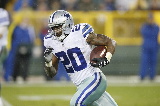 GREEN BAY, WI - DECEMBER 13: Darren McFadden #20 of the Dallas Cowboys runs the ball against the Green Bay Packers during the game at Lambeau Field on December 13, 2015 in Green Bay, Wisconsin. The Packers defeated the Cowboys 28-7. (Photo by Joe Robbins/Getty Images)