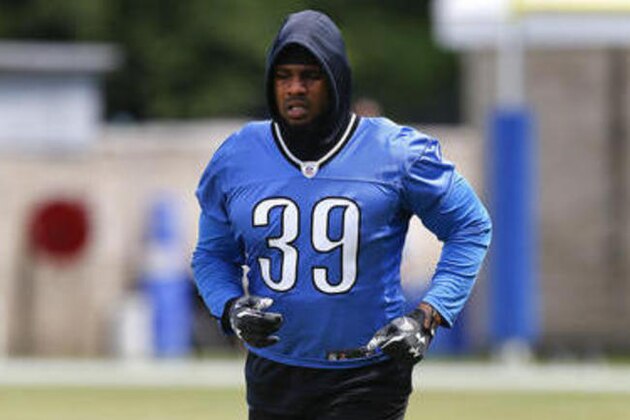 FILE - In this June 14, 2016, file photo, Detroit Lions running back Stevan Ridley runs during NFL football practice in Allen Park, Mich. The Lions have cut Ridley. They made the move Thursday, Aug. 25, before practice. Detroit signed Ridley in April, hoping he would bolster its depth in the backfield after the release of Joique Bell. (AP Photo/Paul Sancya, File)