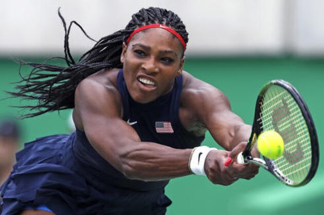 FILE - In this Aug. 7, 2016, file photo, Serena Williams, of the United States, reaches for a return against Daria Gavrilova, of Australia, at the 2016 Summer Olympics in Rio de Janeiro, Brazil.  The first round of the U.S. Open tennis tournament is scheduled for Monday, Aug. 29. (AP Photo/Charles Krupa, File)