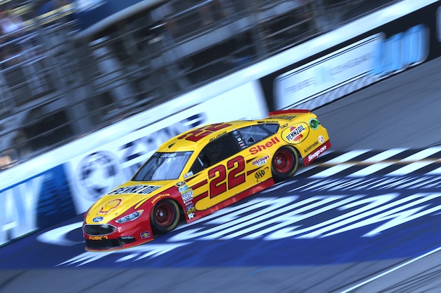 BROOKLYN, MI - AUGUST 26:  Joey Logano, driver of the #22 Shell Pennzoil Ford, drives during qualifying for the NASCAR Sprint Cup Series Pure Michigan 400 at Michigan International Speedway on August 26, 2016 in Brooklyn, Michigan.  (Photo by Jerry Markland/Getty Images)