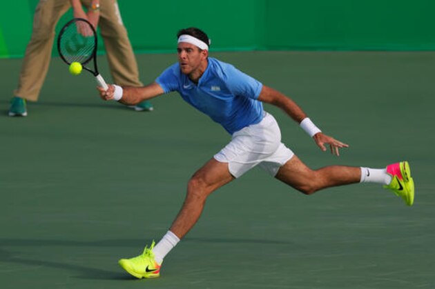 Argentina's Juan Martin del Potro returns to Spain's Roberto Bautista Agut during the men's tennis competition at the 2016 Summer Olympics in Rio de Janeiro, Brazil, Friday, Aug. 12, 2016. (AP Photo/Vadim Ghirda)