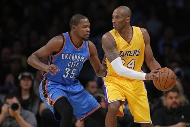 Los Angeles Lakers' Kobe Bryant, right, is defended by Oklahoma City Thunder's Kevin Durant during the first half of an NBA basketball game, Wednesday, Dec. 23, 2015, in Los Angeles. (AP Photo/Jae C. Hong) Los Angeles Lakers' Kobe Bryant, right, is defended by Oklahoma City Thunder's Kevin Durant during the first half of an NBA basketball game, Wednesday, Dec. 23, 2015, in Los Angeles. (AP Photo/Jae C. Hong)