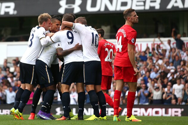 Tottenham Hotspur's English defender Danny Rose celebrates with teammates after scoring during the English Premier League football match between Tottenham Hotspur and Liverpool at White Hart Lane in London, on August 27, 2016. / AFP / JUSTIN TALLIS / RESTRICTED TO EDITORIAL USE. No use with unauthorized audio, video, data, fixture lists, club/league logos or 'live' services. Online in-match use limited to 75 images, no video emulation. No use in betting, games or single club/league/player publications.  /         (Photo credit should read JUSTIN TALLIS/AFP/Getty Images)
