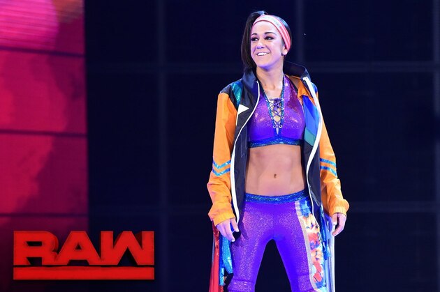Bayley makes her Raw debut to a huge ovation.