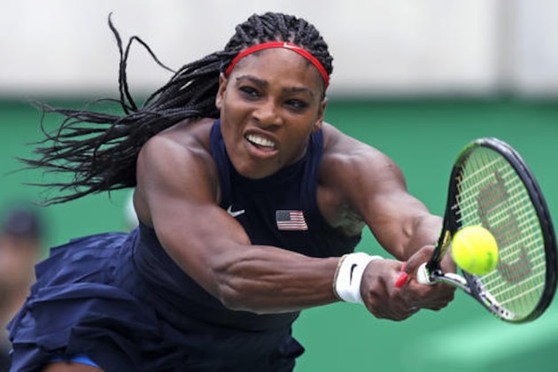FILE - In this Aug. 7, 2016, file photo, Serena Williams, of the United States, reaches for a return against Daria Gavrilova, of Australia, at the 2016 Summer Olympics in Rio de Janeiro, Brazil.  The first round of the U.S. Open tennis tournament is scheduled for Monday, Aug. 29. (AP Photo/Charles Krupa, File)