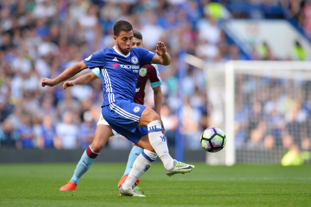 Chelsea's Belgian midfielder Eden Hazard controls the ball during the English Premier League football match between Chelsea and Burnley at Stamford Bridge in London on August 27, 2016. / AFP / GLYN KIRK / RESTRICTED TO EDITORIAL USE. No use with unauthorized audio, video, data, fixture lists, club/league logos or 'live' services. Online in-match use limited to 75 images, no video emulation. No use in betting, games or single club/league/player publications.  /         (Photo credit should read GLYN KIRK/AFP/Getty Images)