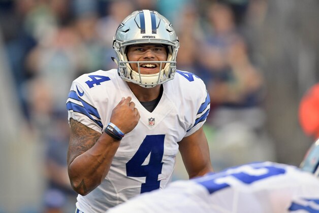 Aug 25, 2016; Seattle, WA, USA; Dallas Cowboys quarterback Dak Prescott (4) makes the call form the line against the Seattle Seahawks during the first half of an NFL football game at CenturyLink Field. Mandatory Credit: Kirby Lee-USA TODAY Sports