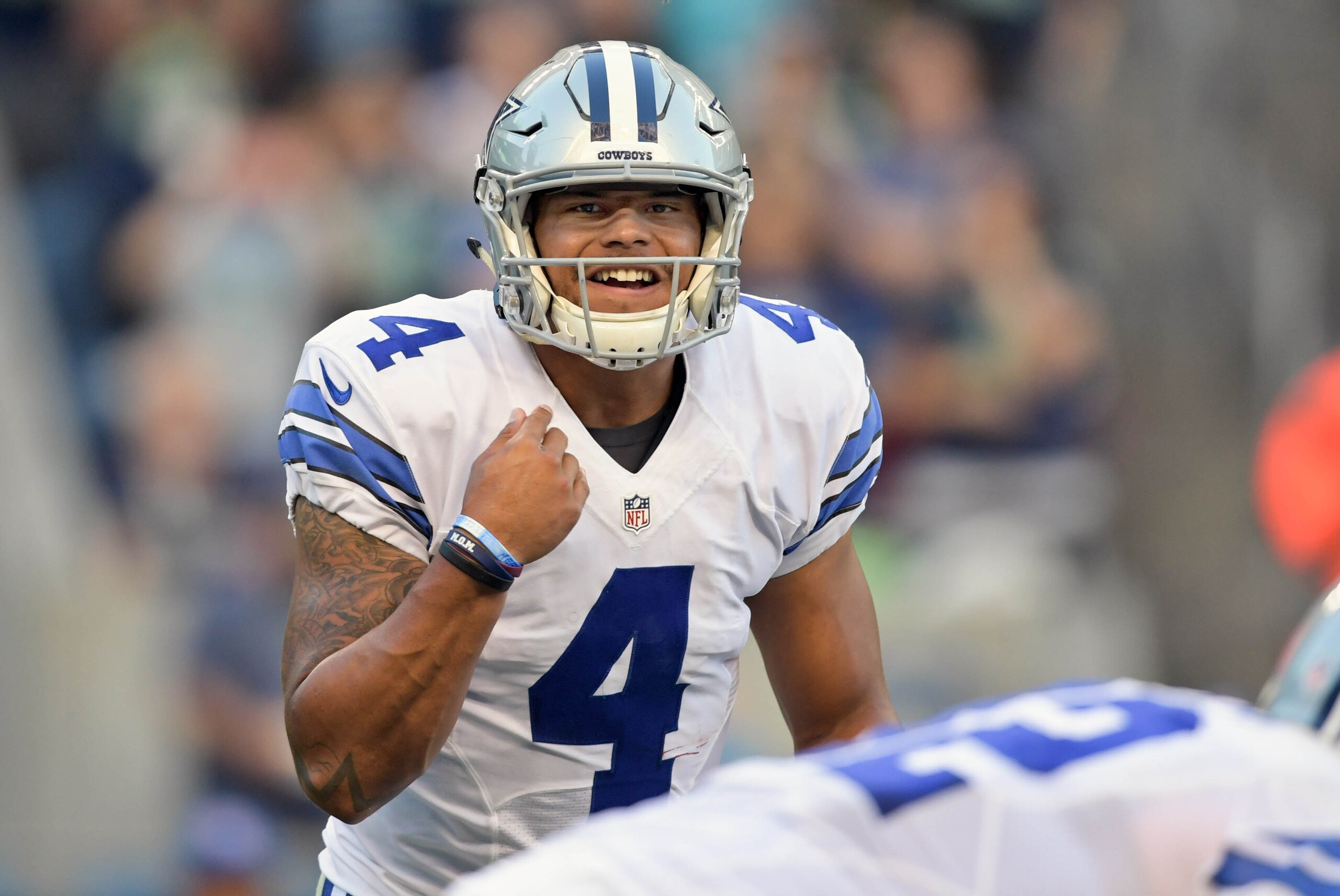 Aug 25, 2016; Seattle, WA, USA; Dallas Cowboys quarterback Dak Prescott (4) makes the call form the line against the Seattle Seahawks during the first half of an NFL football game at CenturyLink Field. Mandatory Credit: Kirby Lee-USA TODAY Sports
