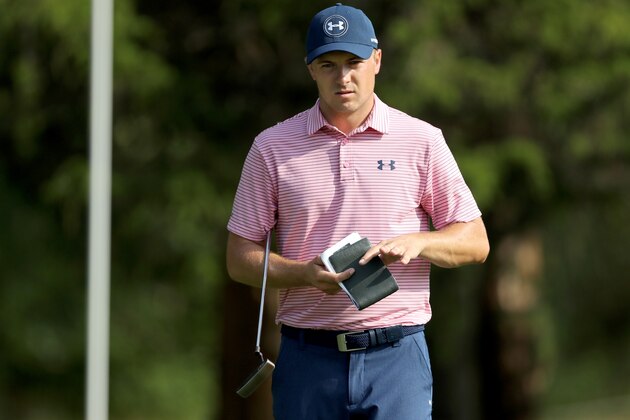 FARMINGDALE, NY - AUGUST 26:  Jordan Spieth of the United States uses his yardage book to line up his putt on the par 5, 13th hole during the second round of The Barclays in the PGA Tour FedExCup Play-Offs on the Black Course at Bethpage State Park on August 26, 2016 in Farmongdale, New York.  (Photo by David Cannon/Getty Images)