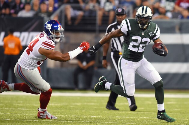 EAST RUTHERFORD, NJ - AUGUST 27:  Matt Forte #22 of the New York Jets runs with the ball around Olivier Vernon #54 of the New York Giants during the first quarter at MetLife Stadium on August 27, 2016 in East Rutherford, New Jersey.  (Photo by Rich Barnes/Getty Images)