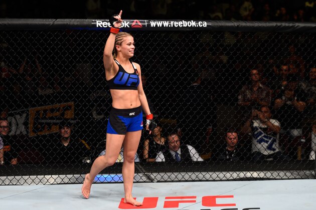 VANCOUVER, BC - AUGUST 27:  Paige VanZant of the United States celebrates her knockout victory over Bec Rawlings of Australia in their women's strawweight bout during the UFC Fight Night event at Rogers Arena on August 27, 2016 in Vancouver, British Columbia, Canada. (Photo by Jeff Bottari/Zuffa LLC/Zuffa LLC via Getty Images)