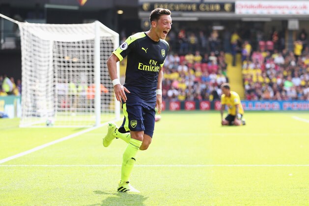 WATFORD, ENGLAND - AUGUST 27:  Mesut Ozil of Arsenal scores his sides third goal during the Premier League match between Watford and Arsenal at Vicarage Road on August 27, 2016 in Watford, England.  (Photo by Christopher Lee/Getty Images)