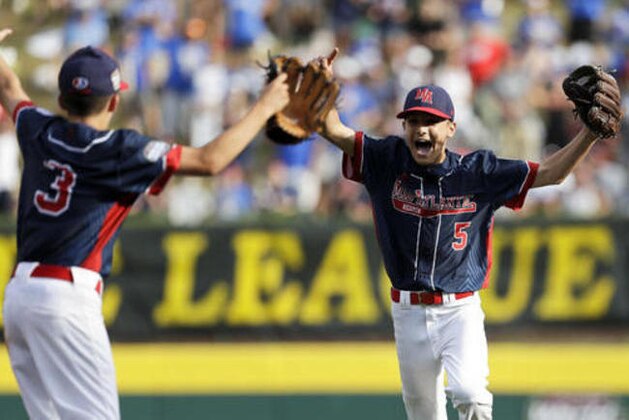Endwell, N.Y.'s Michael Mancini, right, and Jude Abbadessa celebrate after winning the United States championship baseball game against Goodlettsville, Tenn. at the Little League World Series, Saturday, Aug. 27, 2016, in South Williamsport, Pa. Endwell, N.Y. won 4-2 and is scheduled to play South Korea in the World Series tomorrow. (AP Photo/Matt Slocum)
