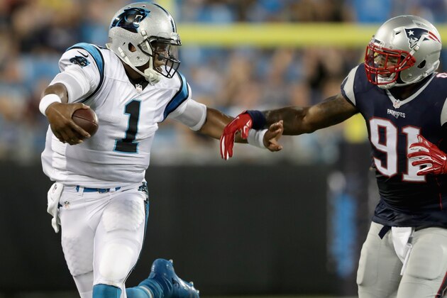 CHARLOTTE, NC - AUGUST 26:   Cam Newton #1 of the Carolina Panthers runs away from  Jamie Collins #91 of the New England Patriots during their game at Bank of America Stadium on August 26, 2016 in Charlotte, North Carolina.  (Photo by Streeter Lecka/Getty Images)