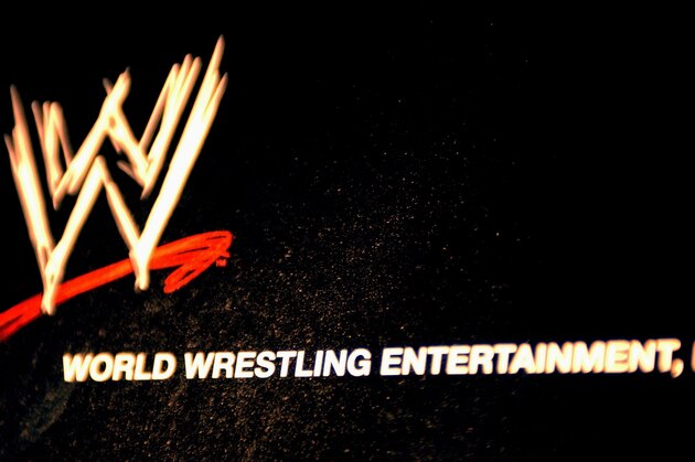 NEW YORK - MARCH 18:  The World Wrestling Entertainment logo hangs on a wall at a media conference announcing the all-star lineup of WWE WrestleMania XIX at ESPN Zone in Times Square March 18, 2003 in New York City.  (Photo by Mark Mainz/Getty Images)
