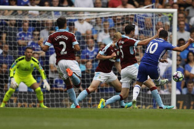 Chelsea's Eden Hazard, right, scores during the English Premier League soccer match between Chelsea and Burnley at Stamford Bridge in London, Saturday, Aug. 27, 2016. (AP Photo/Frank Augstein)