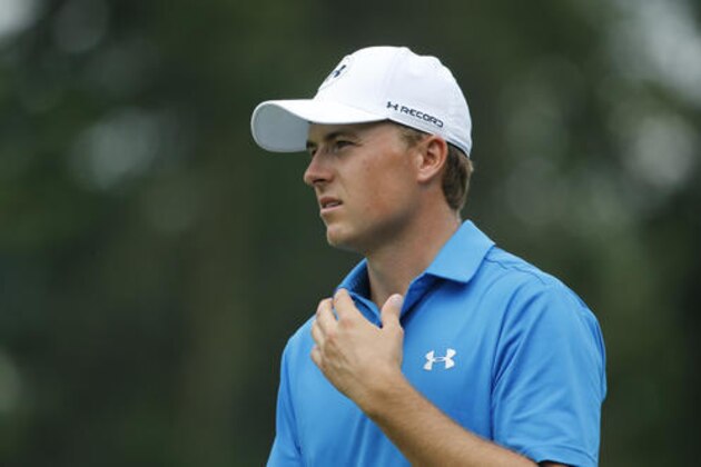 FILE - In this July 29, 2016, file photo, Jordan Spieth watches his approach shot on the fifth hole during the second round of the PGA Championship golf tournament at Baltusrol Golf Club in Springfield, N.J. Spieth missed being part of the Olympics even before the golf began. Rory McIlroy thought it was a big hit and was thankful to be wrong. They were among the top four who chose not to go.  (AP Photo/Mike Groll, File)