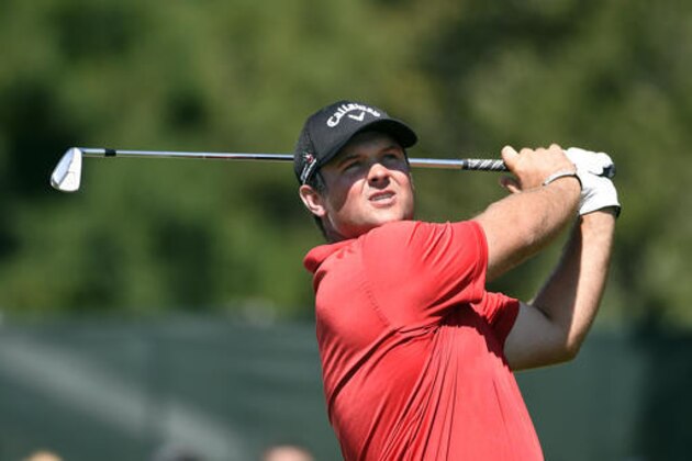 Patrick Reed watches his tees hot from the third hole during the final round of The Barclays golf tournament in Farmingdale, N.Y., Sunday, Aug. 28, 2016. (AP Photo/Kathy Kmonicek)