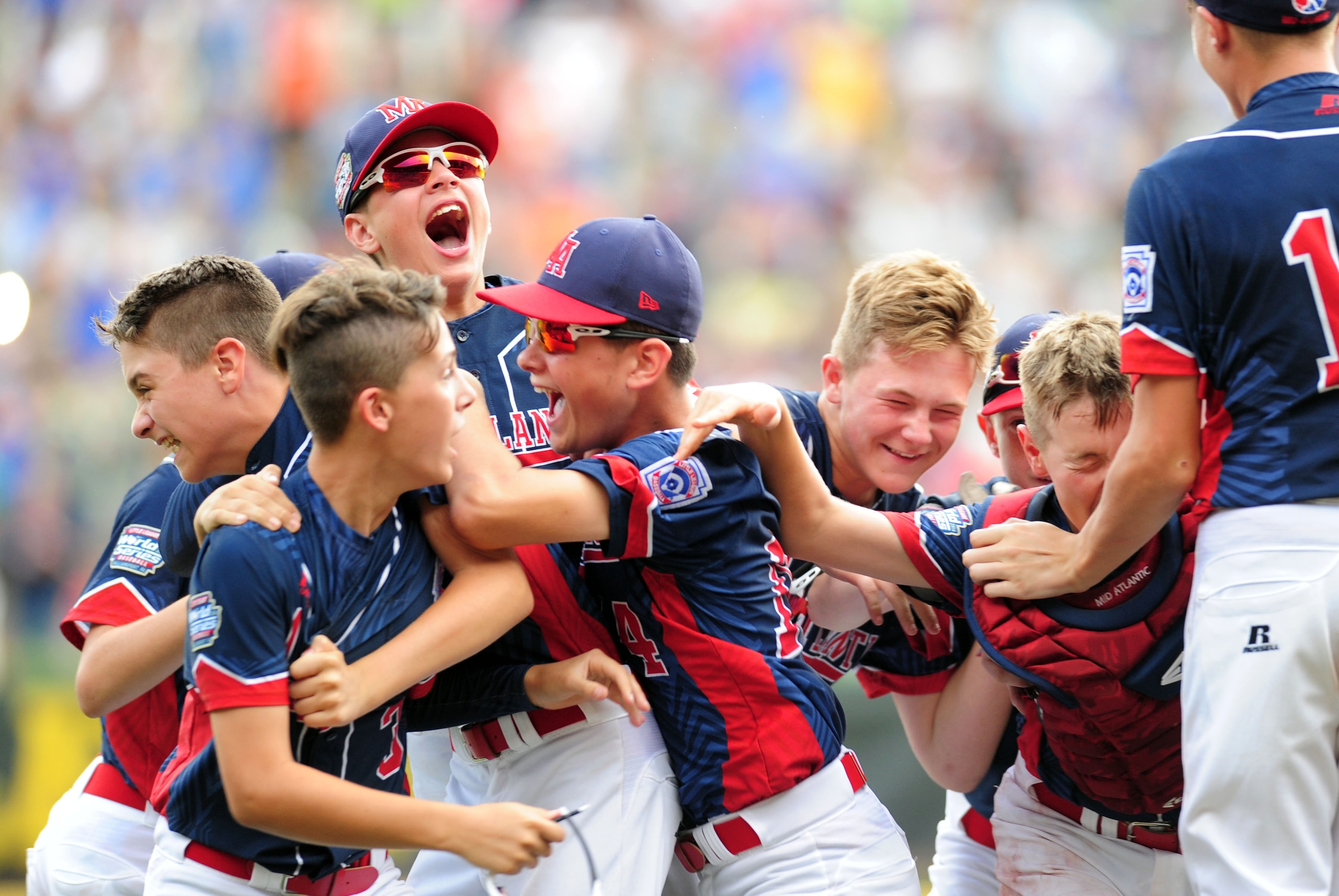 Aug 28, 2016; Williamsport, PA, USA; Mid-Atlantic Region players celebrate after beating the Asia-Pacific Region 2-1 during the championship game of the 2016 Little League World Series at Howard J. Lamade Stadium. Mandatory Credit: Evan Habeeb-USA TODAY Sports