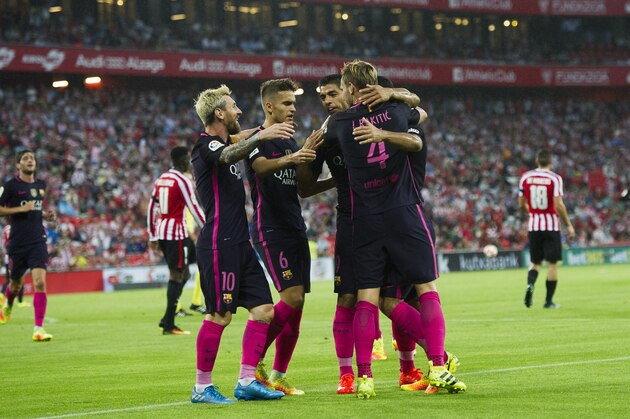 BILBAO, SPAIN - AUGUST 28:Ivan Rakitic (R) of FC Barcelona celebrates with his teammate Lionel Messi, Denis Suarez and  Luis Suarez of FC Barcelona after scoring the opening goal during the La Liga match between Athletic Club Bilbao and FC Barcelona at San Mames Stadium on August 28, 2016 in Bilbao, Spain.  (Photo by Juan Manuel Serrano Arce/Getty Images)