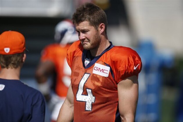 Denver Broncos punter Britton Colquitt (4) takes part in drills during the team's NFL football training camp Saturday, July 30, 2016 in Englewood, Colo. (AP Photo/David Zalubowski)
