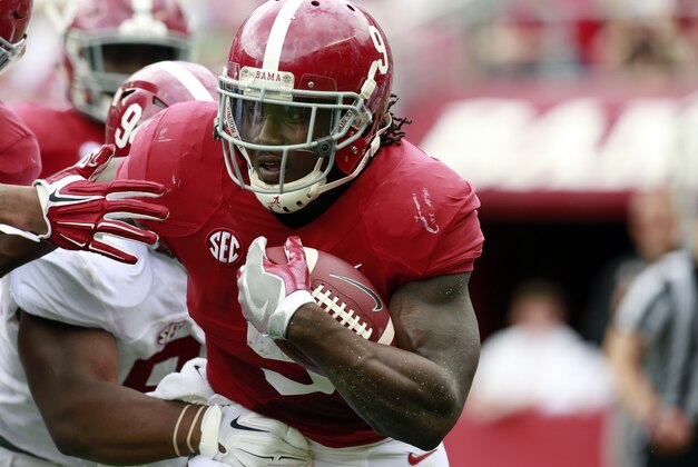 Apr 16, 2016; Tuscaloosa, AL, USA; Alabama Crimson Tide running back Bo Scarbrough (9) carries the ball during the annual A-day game at Bryant-Denny Stadium. Mandatory Credit: Marvin Gentry-USA TODAY Sports