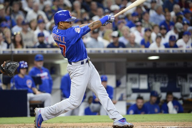 SAN DIEGO, CALIFORNIA - AUGUST 23:  Addison Russell #27 of the Chicago Cubs hits a two-run home run during the fifth inning of a baseball game against the San Diego Padres at PETCO Park on August 23, 2016 in San Diego, California.  (Photo by Denis Poroy/Getty Images)