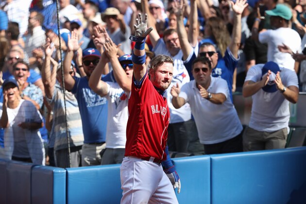 TORONTO, CANADA - AUGUST 28: Josh Donaldson #20 of the Toronto Blue Jays comes out of the dugout for a curtain call after hitting his home run of the game in the eighth inning during MLB game action against the Minnesota Twins on August 28, 2016 at Rogers Centre in Toronto, Ontario, Canada. (Photo by Tom Szczerbowski/Getty Images)